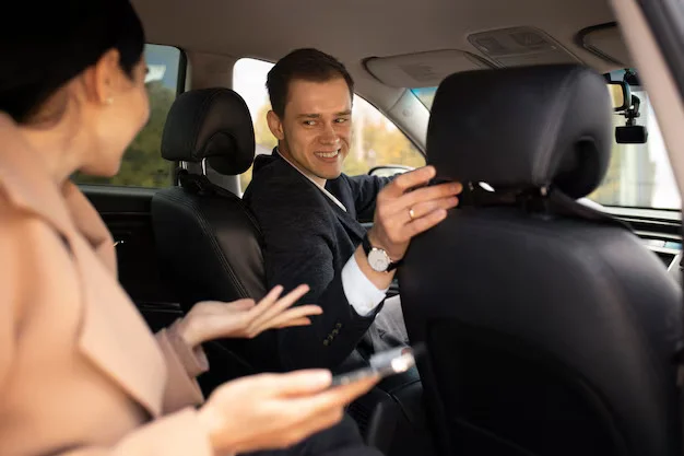 woman talking with taxi driver car 23 2149149583